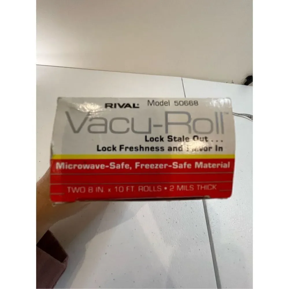 Rival Vacu-Roll model 50668 two 8 inch x 10 feet rolls. 2 miles thick